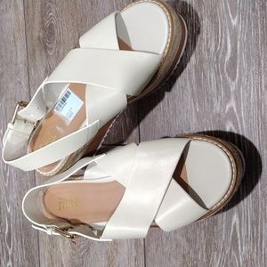 Find off white leather wedge sandals. NWT. Size 8.5